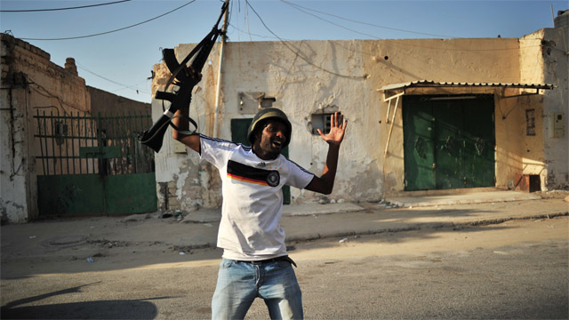 Time to disband Libyan rebel forces