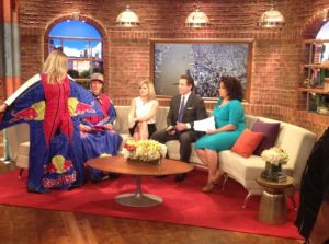 Amy shows off her wingsuit on "New Day." 